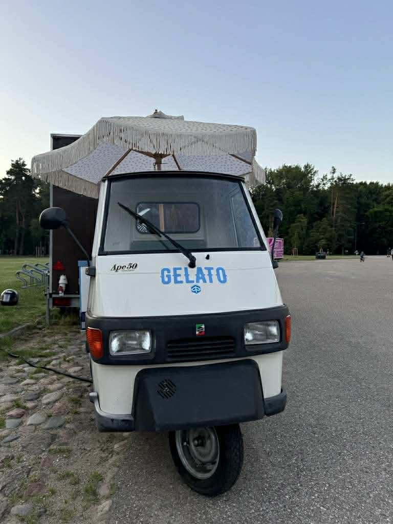 Piaggio Ape 50 front view — classic Italian three-wheeler with GELATO lettering